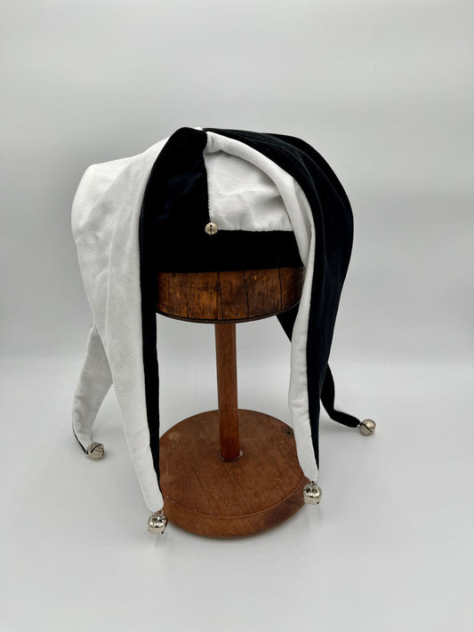 Jester hat side view showing fabric points and bell detail